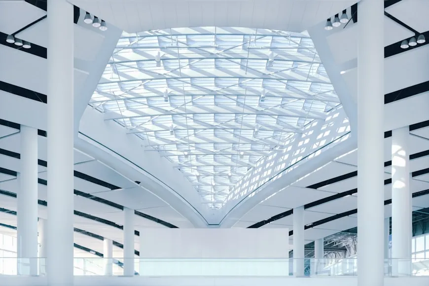 a large white building with a skylight above it